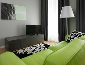 TV a/nebo společenská místnost v ubytování Palace Suite
