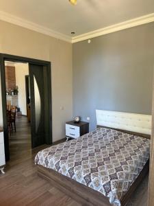 Postel nebo postele na pokoji v ubytování Guesthouse Mtsvane Koncxi 22