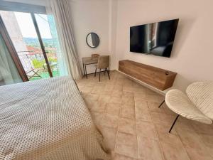 TV a/nebo společenská místnost v ubytování Seaview Methoni