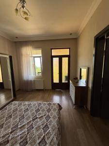 Postel nebo postele na pokoji v ubytování Guesthouse Mtsvane Koncxi 22