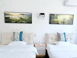 Krevet ili kreveti u jedinici u okviru objekta Beijing Great Wall Shiguang Homestay