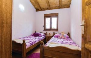 Postel nebo postele na pokoji v ubytování Villa Anita