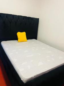 Ένα ή περισσότερα κρεβάτια σε δωμάτιο στο The Njiro Escape +1 φωτογραφίες