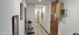 TV a/nebo společenská místnost v ubytování Hostal Absolut Stay