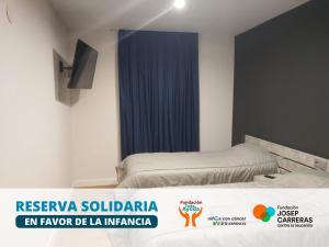 Posteľ alebo postele v izbe v ubytovaní Apartamentos Hi Apartaments Santander 3000