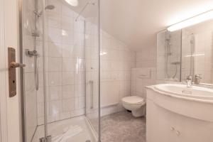 Ein Badezimmer in der Unterkunft Villa Granitz Wind & Wolke