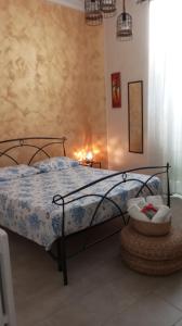 Ένα ή περισσότερα κρεβάτια σε δωμάτιο στο La ninfa B&B