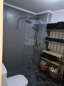 a shower with a glass door in a bathroom at Casa Marquesa in Rojales
