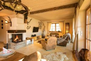 Χώρος καθιστικού στο Chalets-zum-Ilsetal-Schloss-Chalet-Nr-19