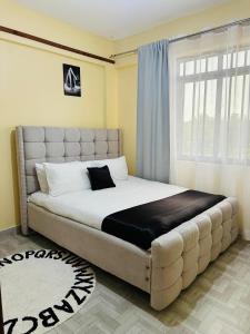 Katil atau katil-katil dalam bilik di Rupa view Suites