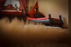 Postel nebo postele na pokoji v ubytování Chalets-zum-Ilsetal-Ilse-Chalet-Nr-19