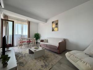 Χώρος καθιστικού στο SOHO Apartment - City View with Rooftop Garden