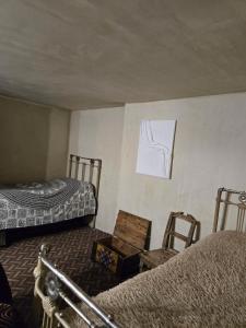 Postel nebo postele na pokoji v ubytování Balcony