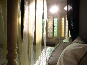 Cama ou camas em um quarto em Dar Souad