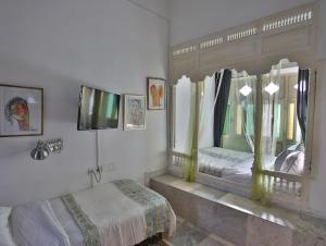 Cama ou camas em um quarto em Dar Souad