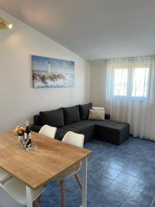 Posezení v ubytování Apartments Ema