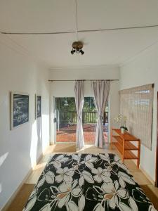 Postel nebo postele na pokoji v ubytování Mazi Vuwu Ponta Malongane 4x4 only