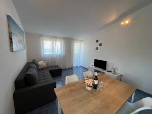 Posezení v ubytování Apartments Ema