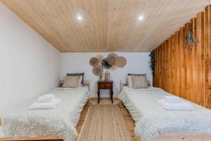 Postel nebo postele na pokoji v ubytování A Casa de Pedra