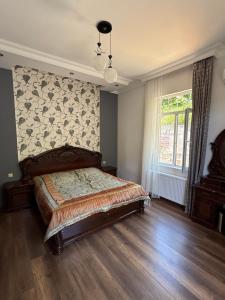 Postel nebo postele na pokoji v ubytování Guesthouse Mtsvane Koncxi 22