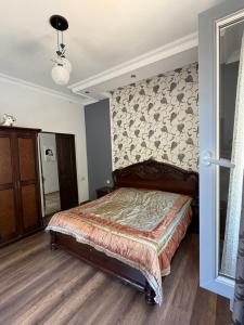 Postel nebo postele na pokoji v ubytování Guesthouse Mtsvane Koncxi 22