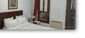 Postel nebo postele na pokoji v ubytování Hostal Absolut Stay + 26 fotografií