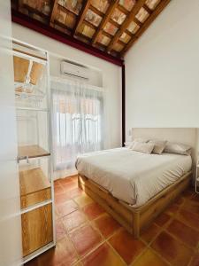 Ένα ή περισσότερα κρεβάτια σε δωμάτιο στο Oliva Lofts & Beach +12 φωτογραφίες