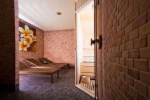 Una cama o camas en una habitación de Apartament Lola SPA z prywatnym Jacuzzi - najbliżej wyciągu - by Royal Aparts