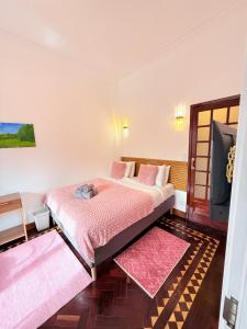 Ένα ή περισσότερα κρεβάτια σε δωμάτιο στο Sintra Mountview Retreat