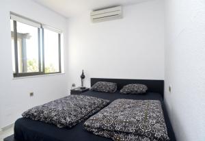 En eller flere senge i et værelse på Beachside penthouse Cala de Mijas