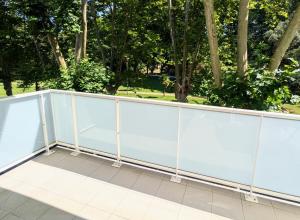 a white fence with trees in the background at T3 neuf Baignots proche Thermes, centre, parking in Dax