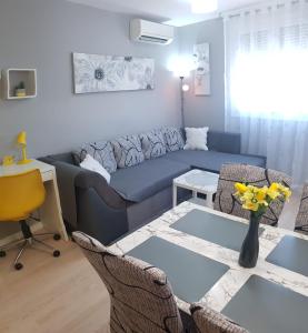 Khu vực ghế ngồi tại Apartment Verdi Split with free private parking space