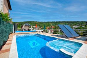 a swimming pool on top of a building with at villa MAK in Balchik