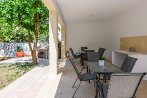 Patio nebo venkovní prostory v ubytování Villa Roxani
