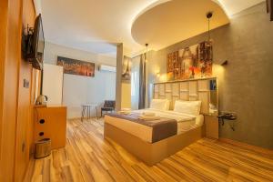 A bed or beds in a room at Monezza Avcılar