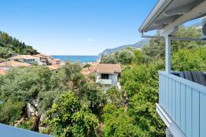 a view from the balcony of a house at Hotel Selini in Agios Nikitas
