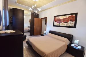 Postel nebo postele na pokoji v ubytování Casa Amoruso - Salento Selection