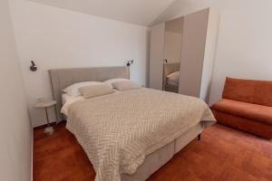 Postel nebo postele na pokoji v ubytování More Medici Apartments