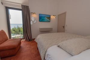 Postel nebo postele na pokoji v ubytování More Medici Apartments