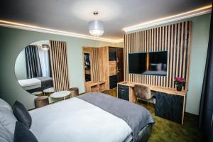 TV a/nebo společenská místnost v ubytování Fit Residence II + 37 fotografií