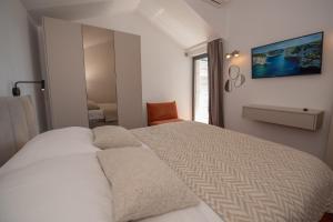 Postel nebo postele na pokoji v ubytování More Medici Apartments