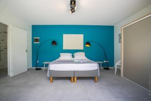 Rúm í herbergi á Villa GRECA