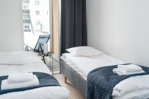 Postel nebo postele na pokoji v ubytování City 1bedroom with nice terace 100mb Wi-fi 3min from Train station