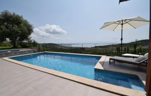 Bazén v ubytování Villa Takale by Villas Guide nebo v jeho okolí