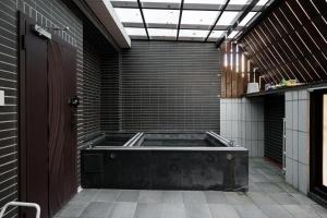 Kép 漫居包棟民宿- 有電梯, 電動車充電樁, 電動麻將, Switch szállásáról Tungsanban a galériában
