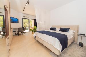 Postel nebo postele na pokoji v ubytování More Medici Apartments