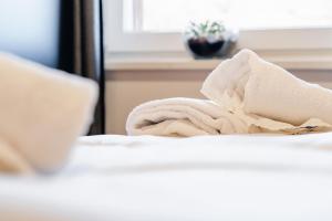 Postel nebo postele na pokoji v ubytování Clofers Relax Residences Rattendorf