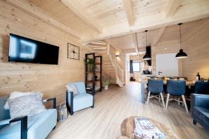 TV a/nebo společenská místnost v ubytování Clofers Relax Residences Rattendorf