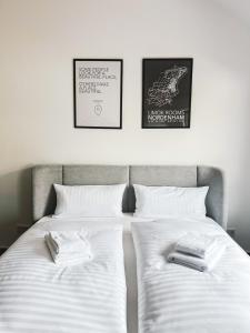 Postel nebo postele na pokoji v ubytování Limok Apartments