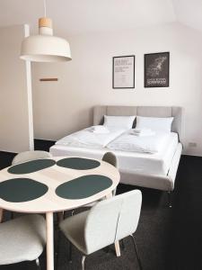 Postel nebo postele na pokoji v ubytování Limok Apartments